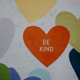 hearts with the words "Be Kind"